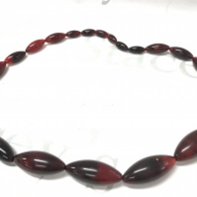A large cherry amber style lucite necklace , 155g total weight 80cm . Postage category A- NO RESERVE