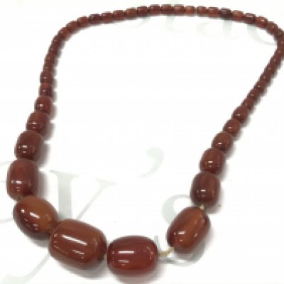 Genuine Bakelite cherry amber colour necklace . 65g 60cm Postage category A- NO RESERVE