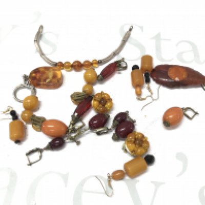 Bakelite and amber style ear clips, bracelet ,key ring , pendant etc 110g . Postage category A- NO RESERVE