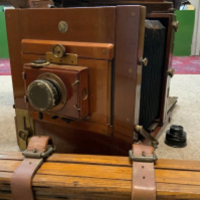 A cased Houghton Ensign plate camera, original case, Tripod Lenses, plates.