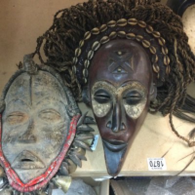 A collection of six African tribal masks including ceremonial and chokwe .