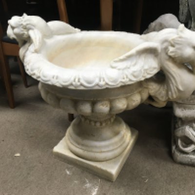 A pair of marble urns of classical style 46 cm .