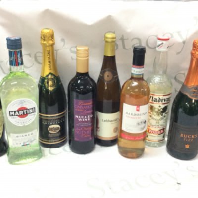 A collection of wine and spirits including Martini , Vladivar Imperial Vodka, Legendario Elixir De Cuba, Faubert Premier Cru Champagne . This lot cannot be posted