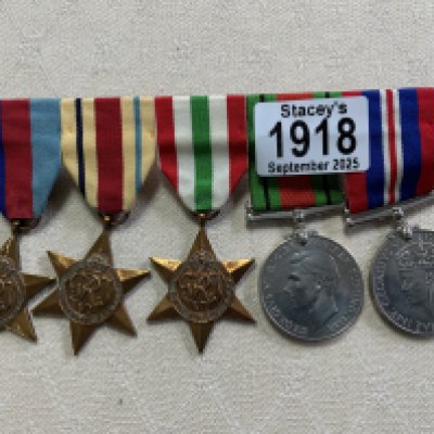 A Set of 5 WW2 military service medals. 39-45 Star/Africa Star/Italy Star/Defence medal/ 39-45 General service medal.