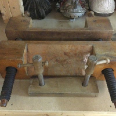 A large book press and a smaller example (2). Shipping category D.