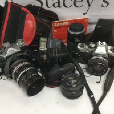 WITHDRAWN - A collection of SLR cameras and lenses. Shipping category D.