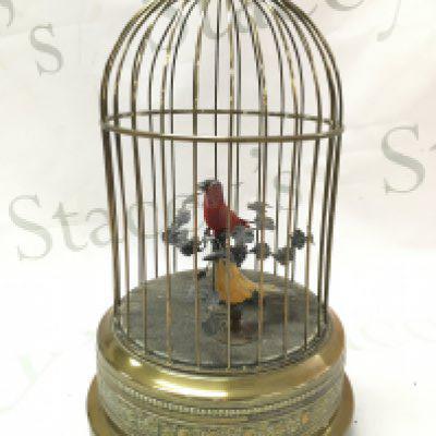 A reproduction singing bird cage automation. Approximately 28cm tall. ( seen working) Postage category C