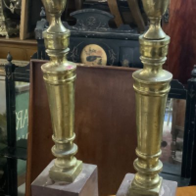 A pair of Red marble and cast bronze candlesticks. 47cm.- NO RESERVE