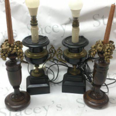 A pair of oak candle sticks and classical style lamps , this lot cannot be posted