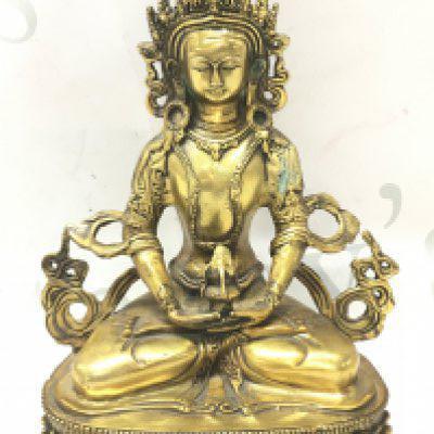 A bronze Buddha figure , 19.5cm tall. Postage cat B