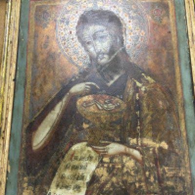 A framed tempera on wooden panel Russian Icon of God holding the Christ child and giving a benediction