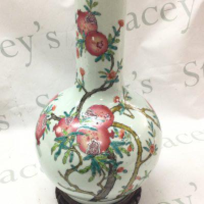 A Chinese Famille Rose Pomegranate vase 39cm tall. Some flaws in the glaze but no obvious damage or restoration.This lot cannot be posted