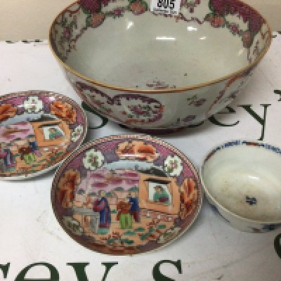 An 18th Century Chinese Export porcelain bowl painted with scrolls and foliage a pair of dishes decorated with figures and a tea bowl (some damage)
