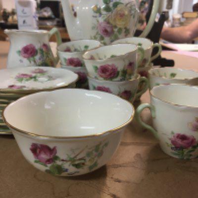 A Royal Doulton coffee set moss rose .
