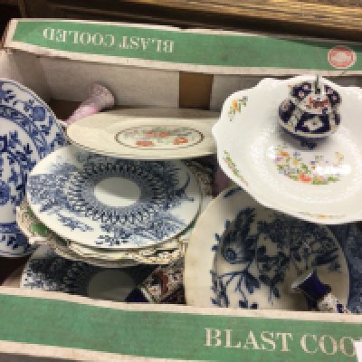 A box containing decorative ceramics plates vases and candle sticks No Reserve