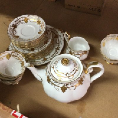 A royal Albert gold on white bone china tea set. This lot cannot be posted