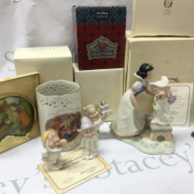 A collection of boxed Disney porcelain Lenox figures including Dopeys Sweet Reward, Dopey and Sneezy salt and pepper set , Dopey showcase , Votive vase- NO RESERVE