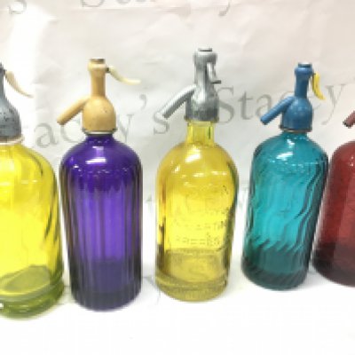 Five vintage coloured glass soda syphons . This lot cannot be posted