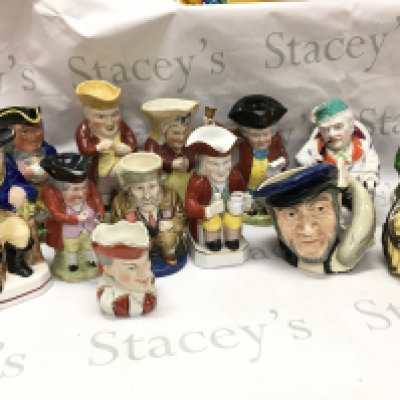 A collection of ceramic Toby jugs , a ceramic tobacco jar of a man smoking a pipe, monkey tea jug etc. this lot cannot be posted