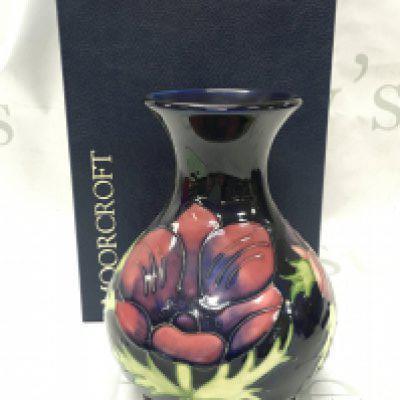 A Boxed Moorcroft Anemone vase , 16cm tall.
