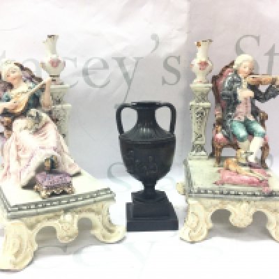 A pair of classical style seated couple figures (20cm tall approx. Damaged and restored )and a late 19th century bronze twin handled vase with putti scene decoration, 13cm tall. This lot cannot be posted- NO RESERVE