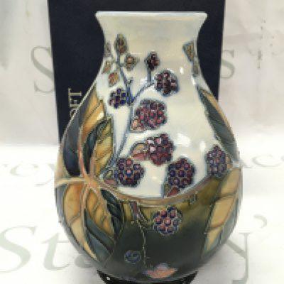 A boxed Moorcroft bramble vase , 19cm tall. This lot cannot be posted
