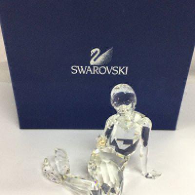 A boxed Swarovski Crystal glass Mermaid with pearl figure . This lot cannot be posted- NO RESERVE