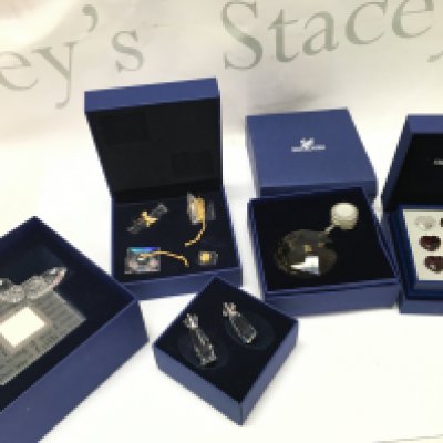 Five Swarovski Crystal items including a cruet set, poetry photo frame , sun catcher , tic tac toe, graduation set. Postage category b