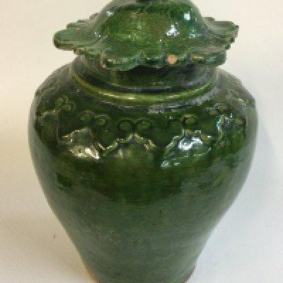 A Chinese pottery baluster vase in Kelly green , Ming style . 22cm tall. No reserve