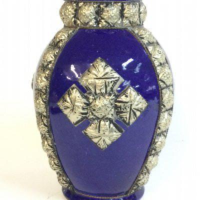 A blue pottery Moroccan 19th century vase encrusted with silver colour Maillechort, 22cm tall.