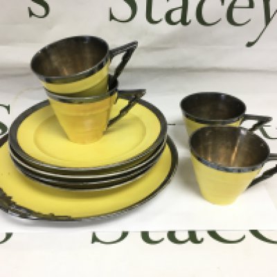 A four place setting sterling silver coated part tea set. Shipping category D.