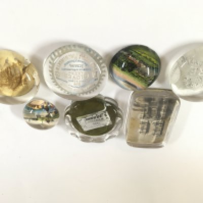 A lot of seven mixed paperweights.