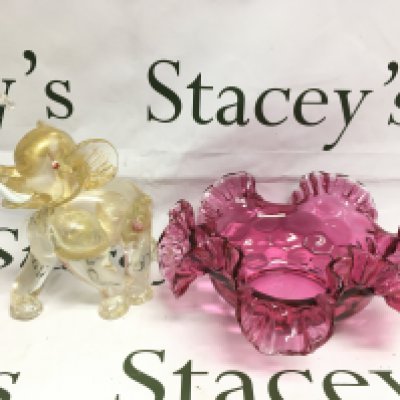 A Murano glass figure of an elephant and a cranberry glass dish (2). Shipping category D.