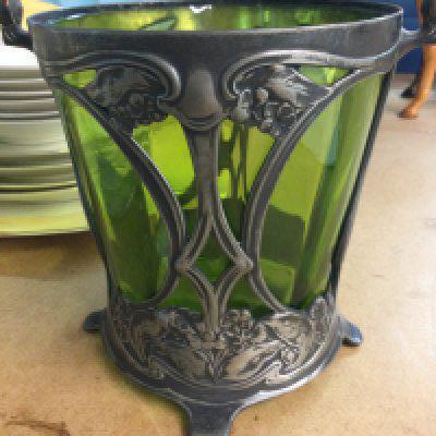 A WMF pewter basket of Art Nouveau design inset with a green glass Lining.