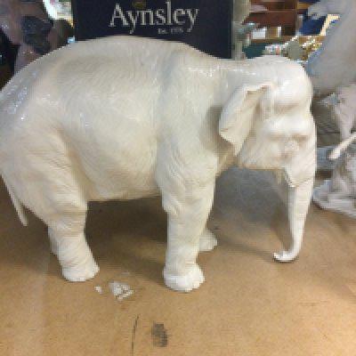 A Nymphenburg porcelain figure in the form of a Indian Elephant 28 x 23 cm ,