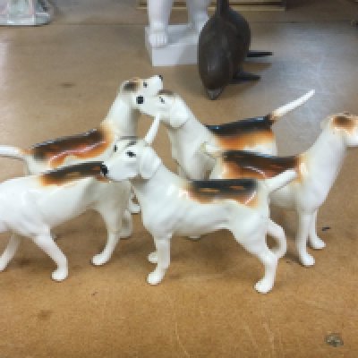 A collection of five Beswick hounds .