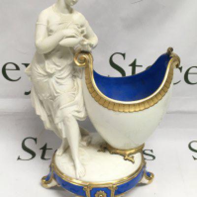 A Minton style figural vase, approx 36cm. Shipping category D.