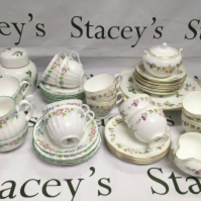 Two tea sets comprising Wedgwood 'Mirabelle' and Royal Worcester 'English Garden'. Shipping category D.