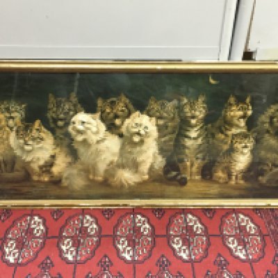 A framed Louis Wain (1860-1939) Cats chorus by moonlight print. Frame dimensions 102x46cm- NO RESERVE