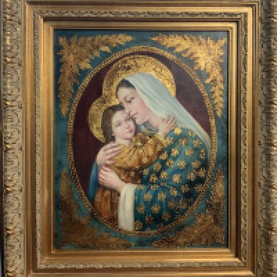 A gilt framed oil on canvas oil on canvas acting of Madonna and child . 74cm x 63cm