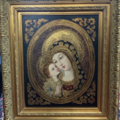 A gilt framed oil on canvas painting of The Madonna and Child. 73cm x 63cm.