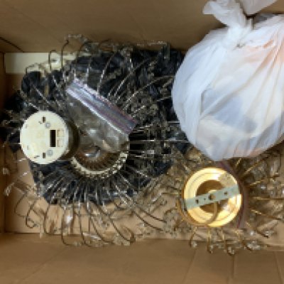 A chandelier style standard lamp together with 3 modern chandeliers.