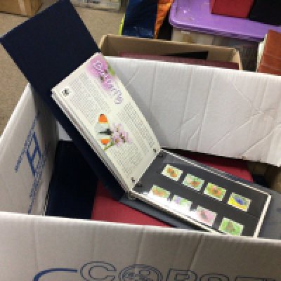 A box containing Isle of Man unused pictorial presentation packs in albums.- NO RESERVE