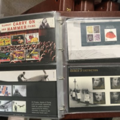 Five albums containing well presented British Pictorial Presentation Stamp packs each album with approximately 50+ covers and some loose covers.
