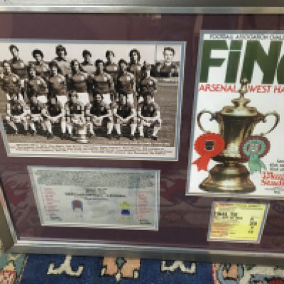 A framed West Ham 1980 FA cup winners picture together with a copy of the programme and three other programs.