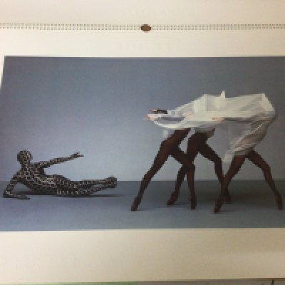 A collection of Guinness Advertising Calendars posters and 1988 19The Pirelli calendar and others and a large coaching history book.