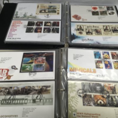 A box of First Day Covers. Shipping category D.