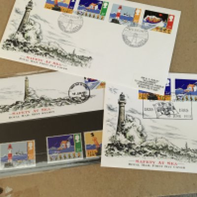 A box containing GB and world stamps . First day covers and Royal mail