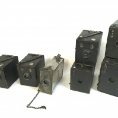 Six vintage box cameras including Kodak Brownies, Klimax developing tank etc. postage catC
