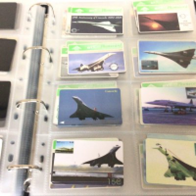 An Album containing an Extensive collection of well presented pictorial phone cards including Chinese phone cards British Phone cards.